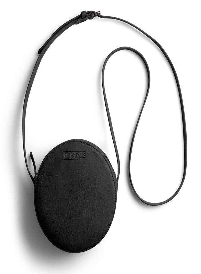 DailyObjects Orbis Round Sling Crossbody Bag For Women| Stylish Solid Black Faux Leather Purse With Slip Pocket & 2 Compartments Inside| Zip Closure & Adjustable Strap| Storage Space For Essentials - Image 4